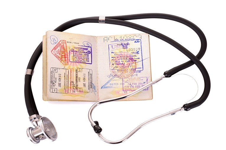 "passport with stethoscope"